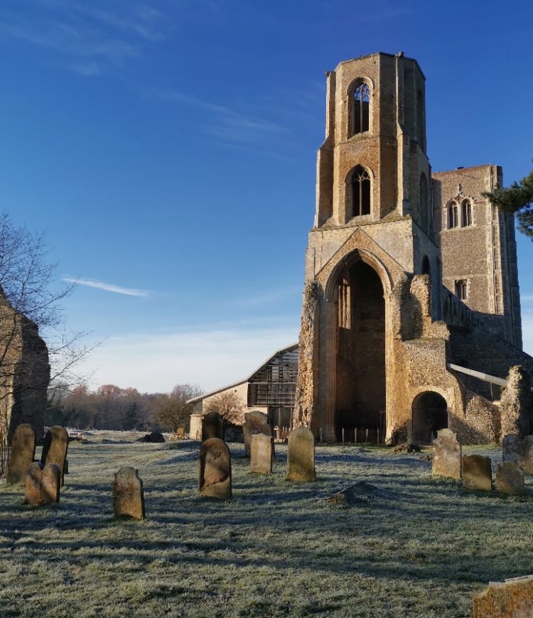 Wymondham Abbey taken from the East end showing the ruins of the old monastery